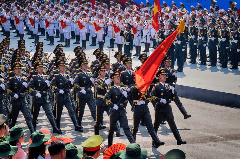 ap_6811b071ed32a-1745989745 Chinese soldiers participate in a parade during the celebration for the 50th anniversary of the end of the Vietnam War on Wednesday, April 30, 2025, in Ho Chi Minh City, Vietnam. (AP Photo/Richard Vogel)