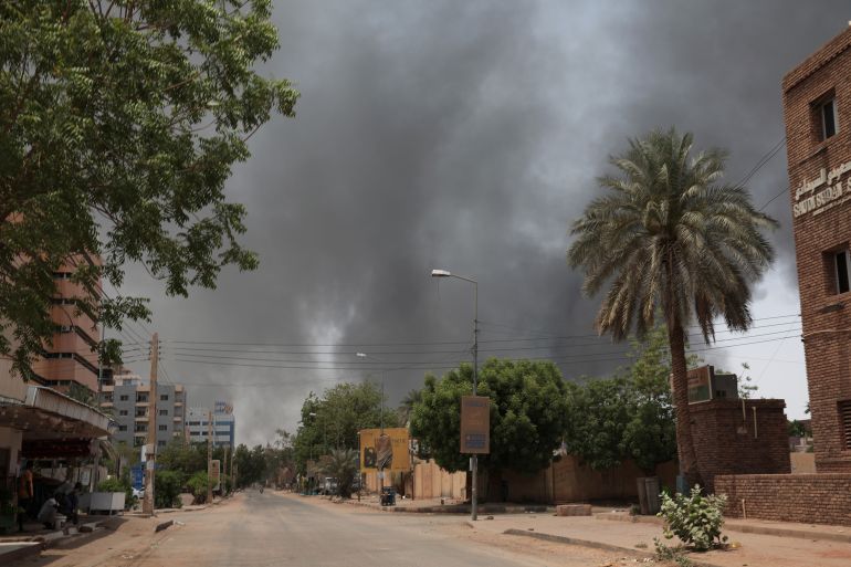 ap_68124cb5c8455-1746029749 FILE - Smoke is seen rising in Khartoum, Sudan, April 15, 2023. (AP Photo/Marwan Ali, File)