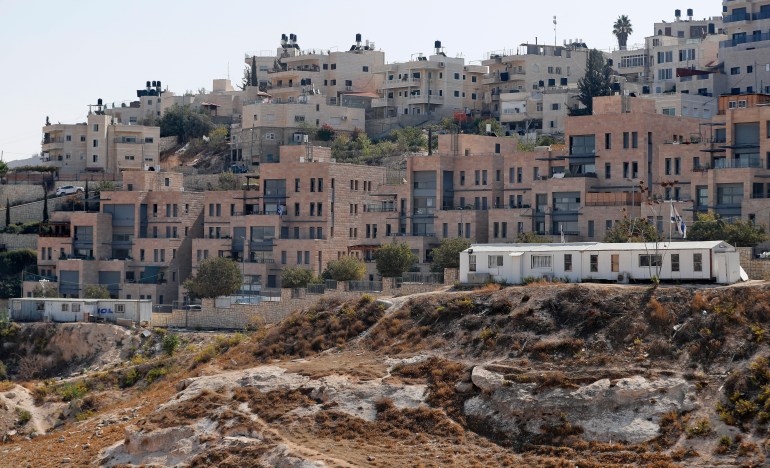 d984d8a8-2-1726231419 A picture taken on October 25, 2017 from Jabel Mukaber, a Palestinian neighbourhood in Israeli-occupied East Jerusalem shows the Israeli settlement of Nof Zion. Israeli authorities on Wednesday approved a major expansion of an east Jerusalem settlement, signing off on plans to add 176 homes, the city's deputy mayor said. The expansion would create the largest Israeli settlement inside a Palestinian neighbourhood of the city, NGOs say. It will allow the Nof Zion settlement to add 176 housing units to the 91 existing homes. (Photo by AHMAD GHARABLI / AFP)