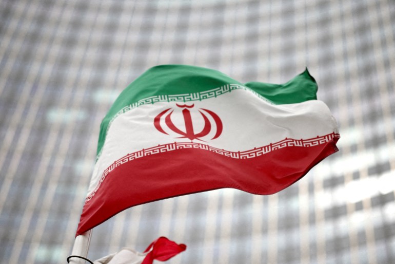 d987d984d8b3d98a3-1735478489 FILE PHOTO: Iranian flag flies in front of the UN office building, housing IAEA headquarters, in Vienna, Austria, May 24, 2021. REUTERS/Lisi Niesner/File Photo