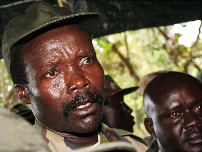 de4ddcd4-0346-4eed-9574-492965573296 (FILES) A file picture taken on November 12, 2006 of then leader of the Lord's Resistance Army (LRA) Joseph Kony answering journalists' questions at Ri-Kwamba, in Southern Sudan. The United States on April 3, 2013 posted a $5 million reward for information leading to the arrest of Lord's Resistance Army chief Joseph Kony, and a similar bounty for three other rebel leaders. Kony has been on the run in the jungles of Central Africa, but the LRA has waged a fierce insurgency across four countries for two decades. It is notorious for mutilating victims and abducting children for use as sex slaves and soldiers. AFP PHOTO/ POOL - STUART PRICE