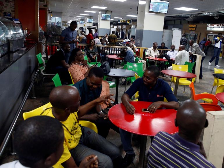 People sit at Murtala Muhammed International Airport before the arrival of the Nigerian Women’s Bobsled Team, in Lagos, Nigeria, as part of preparations ahead of the 2018 Pyeongchang Winter Olympic Games, February 1, 2018. REUTERS/Afolabi Sotunde