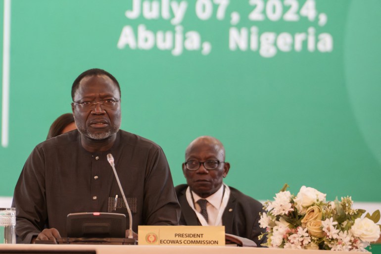 ECOWAS President Omar Alieu Touray addresses the Heads of State and delegates during the Economic Community of West African States (ECOWAS) summit in Abuja, Nigeria July 7, 2024. REUTERS/Marvellous Durowaiye