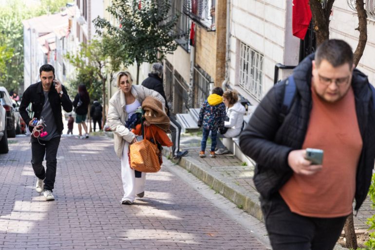 gettyimages-2211592239-1745423906 ISTANBUL, TURKEY - APRIL 23: People gather outside after a 6.2 magnitude earthquake hit off the coast of Istanbul on April 24, 2025 in Istanbul, Turkey. Turkey Metropolitan Municipality reported that no major incidents or injuries were recorded after a 6.2 magnitude earthquake struck off the coast of Istanbul. (Photo by Burak Kara/Getty Images)