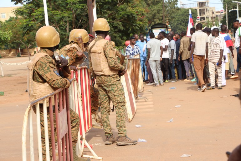 epa10216248 Burkina Faso military close a street in Ouagadougou, Burkina Faso, 30 September 2022. Gunshots have been heard near the presidential palace in Ouagadougou with what some residents claim to be an alleged coup attempt. Access has been blocked by the military to some government buildings including the national assembly and the national broadcaster. In January 2022 the current head of state, Lt-Col Paul-Henri Damiba, ousted President Roch Kabore through a coup. Lieutenant Colonel Paul-Henri Damiba has called for calm. EPA-EFE/ASSANE OUEDRAOGO