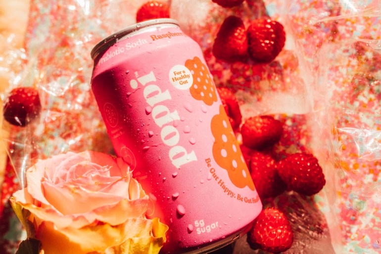 prebiotic-soda2-1744467077 Seattle, WA USA - 01 14 2022: pink 12 oz can of Poppi Prebiotic Soda Raspberry Rose