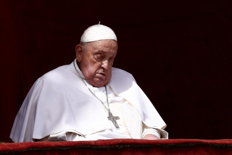 Pope Francis appears on a balcony on the day the "Urbi et Orbi" (to the city and to the world) message is delivered, at St. Peter's Square, on Easter Sunday, in the Vatican, April 20, 2025. REUTERS/Yara Nardi