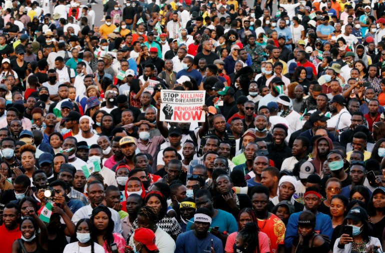 rtx8333s Demonstrators gather during a protest over alleged police brutality in Lagos