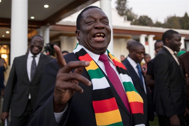 untitle56g56gd-2 President-elect Emmerson Mnangagwa steps onto the lawn to pose for photographs after attending a press conference on August 3, 2018 in Harare, Zimbabwe. Zimbabwe Electoral Commission (ZEC) officials last night announced the re-election of President Emmerson Mnangagwa of the ruling Zimbabwe African National Union - Patriotic Front (ZANU-PF). The election was the first since Robert Mugabe was ousted in a military coup last year, and featured a close race between Mnangagwa and opposition candidate Nelson Chamisa of the Movement for Democratic Change (MDC Alliance). Deadly clashes broke out earlier in the week following the release of parliamentary election results, amid allegations of fraud by Chamisa and MDC supporters. (Photo by Dan Kitwood/Getty Images)