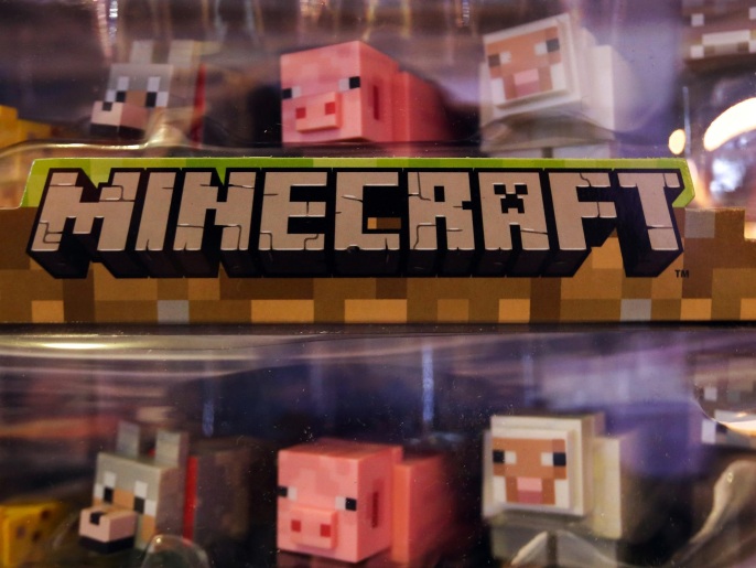 Characters from game Minecraft, produced by Mojang AB, sit displayed for sale during the EGX gaming conference at Earls Court in London, U.K., on Thursday, Sept. 25, 2014. Sony Corp. will begin selling its PlayStation TV set-top box in the U.S. and Europe next month with almost 700 games available, including select Angry Birds, Borderlands, Lego and FIFA soccer titles.