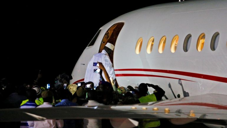 316fbc70-574c-4f45-9d15-dc2387169f7b Former Gambian president Yahya Jammeh boards a private jet before departing Banjul airport, Gambia January 21, 2017 into exile. REUTERS/Afolabi Sotunde