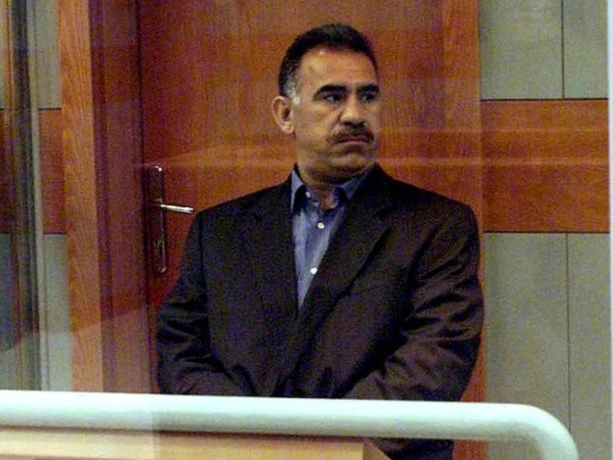 60f225ab-2ff3-4b80-bac9-0445904035ae A picture taken on May 31, 1999 shows Abdullah Ocalan, leader of the rebel Kurdistan Workers Party PKK, sitting amidst tight security in a bullet-proof case during his trial at the military prison at Imrali island off Turkish coast, 31 May 1999. The Council of Europe's anti-torture committee on March 6, 2008 urged Turkey to end the solitary confinement of jailed Kurdish rebel leader Abdullah Ocalan highlighting the threat to his mental health.