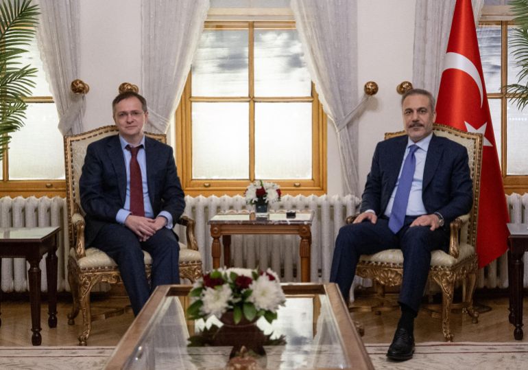 afp_6826d17daeb8-1747374461 This handout photograph taken and released by Turkish Foreign Ministry press service on May 15, 2025, shows Turkish Foreign Minister Hakan Fidan (R) with Russia's delegation head Vladimir Medinsky (L) at the Dolmabahce Palace in Istanbul.