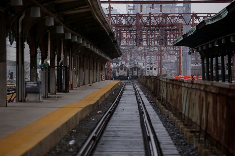afp_682829f94e6e-1747462649 TOPSHOT - Trains sit at the Hoboken Station in Hoboken, New Jersey, during a transit strike on May 16, 2025.