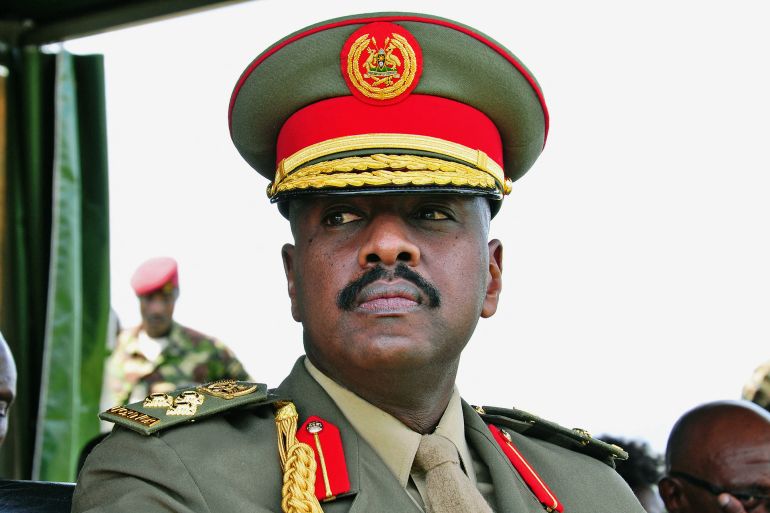 The son of Uganda's President Yoweri Museveni, Major General Muhoozi Kainerugaba attends a ceremony in which he was promoted from Brigadier to Major General at the country's military headquarters in Kampala on May 25, 2016. The son of Uganda's President Yoweri Museveni, one of Africa's longest-serving leaders, has rejected claims that he plans to succeed his father, reports said Thursday. Muhoozi Kainerugaba, speaking on May 25 after he was promoted from Brigadier to Major General, heading the Special Forces Command (SFC), said he was "happy with being in the military", the government-owned New Vision newspaper reported. (Photo by PETER BUSOMOKE / AFP)