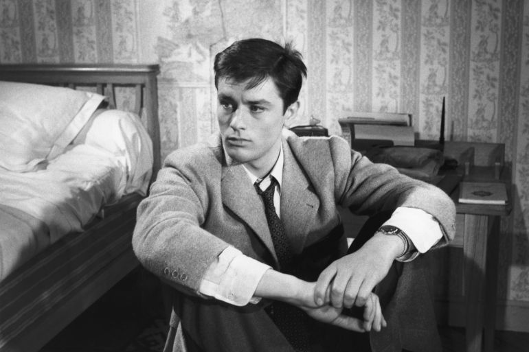 alain-delon2-1748016141 French actor Alain Delon on the set of Le Chemin des Ecoliers, directed by Michel Boisrond. (Photo by Sunset Boulevard/Corbis via Getty Images)