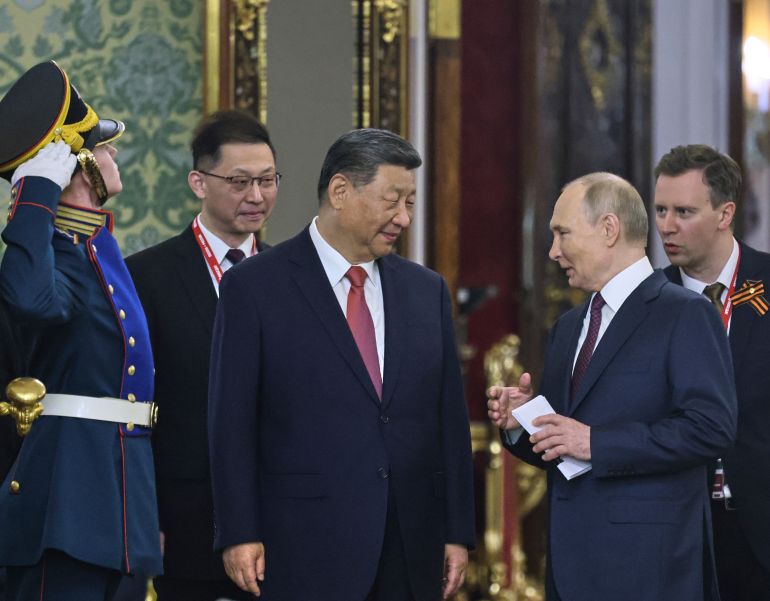 ap_681c8183832e5-1746698627 Russian President Vladimir Putin, right, and China President Xi Jinping talk during their meeting at the Kremlin in Moscow, Russia, Thursday, May 8, 2025, ahead of celebrations of the 80th anniversary of the Soviet Union's victory over Nazi Germany during the World War II. (Yuri Kochetkov/Pool Photo via AP)