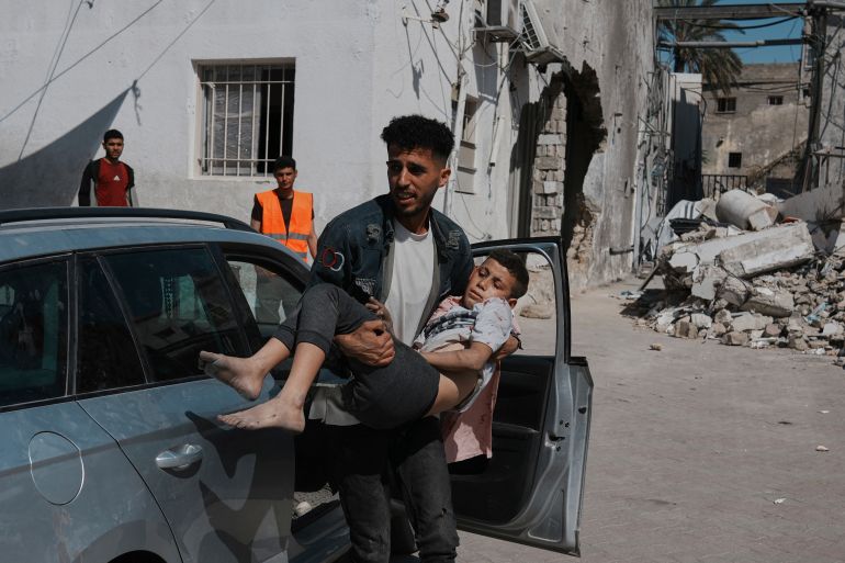 ap_683a54420244c-1748653122 A Palestinian boy, injured following an Israeli airstrike, is brought for treatment to the Baptist Hospital in Gaza City, Friday, May 30, 2025. (AP Photo/Jehad Alshrafi)
