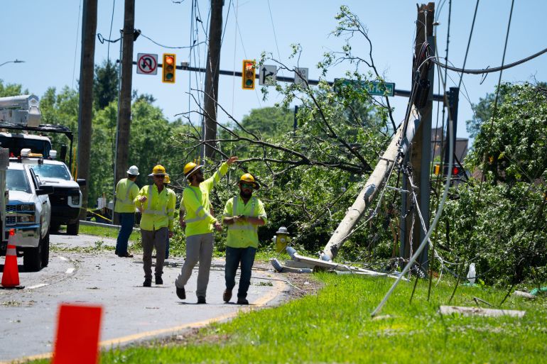 Alexandria, United States - May 17 : Some residents are without power and streets are closed in part of Alexandria, VA on Saturday, May 17, 2025 following a storm on Friday. Contracters work to replace broken electrical poles on Van Dorn Street between Holmes Run Pkwy and Landmark St. (Photo by Sarah L. Voisin/The Washington Post via Getty Images)