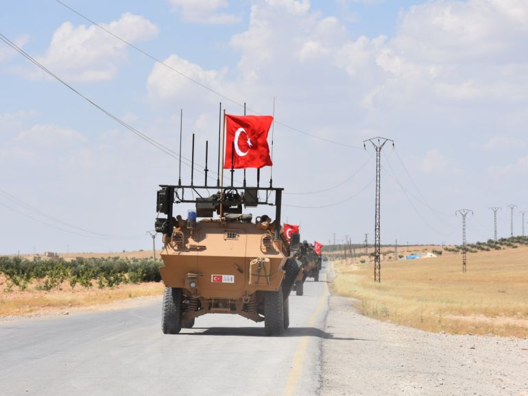 bfa6ab94-87f3-4408-a21a-022985a4d002 Turkish army completes third round of patrols in Manbij- - MANBIJ, SYRIA - JUNE 22: Armoured vehicles of Turkish Armed Forces patrolling in the northern Syrian city of Manbij on June 22, 2018. Turkish Armed Forces on Friday completed their third round of patrolling in the northern Syrian city of Manbij as part of a deal with the U.S. to rid the area of the YPG/PKK terror group.