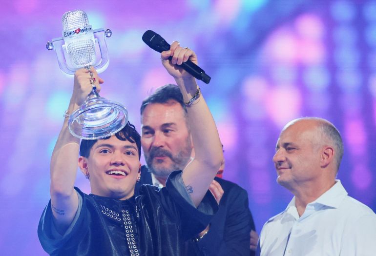 JJ, representing Austria, winner of the 2025 Eurovision Song Contest, holds the trophy during the Grand Final, in Basel, Switzerland, May 18, 2025. REUTERS/Denis Balibouse