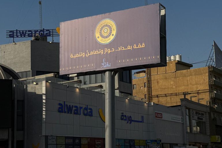 d982d981d8a8d8ba4-1746629312 لافتات عن القمة العربية في شوارع بغداد خاصة للجزيرة نت