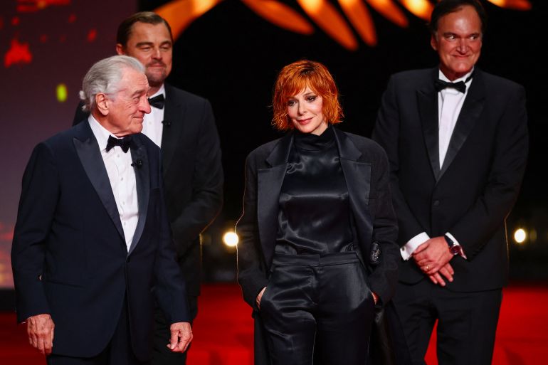 file-88441-1747167308 Leonardo DiCaprio, Quentin Tarantino, Robert De Niro and Mylene Farmer, pose on stage at the end of the opening ceremony, before the screening the film "Partir un jour" (Leave One Day) Out of competition at the 78th Cannes Film Festival in Cannes, France, May 13, 2025. REUTERS/Sarah Meyssonnier