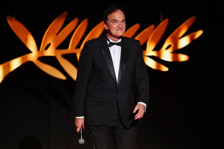 file-88442-1747167319 Quentin Tarantino delivers arrives on stage to open the festival during the opening ceremony and the screening the film "Partir un jour" (Leave One Day) Out of competition at the 78th Cannes Film Festival in Cannes, France, May 13, 2025. REUTERS/Sarah Meyssonnier