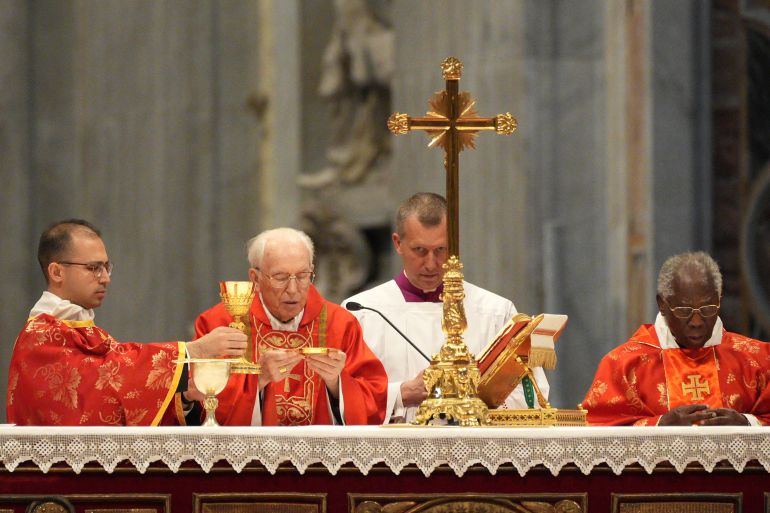 VATICAN CITY, VATICAN - MAY 7: Cardinale Giovanni Battista Re (2nd L) leads a mass for the election of the Roman Pontiff, prior to the start of the conclave, at St Peter's Basilica on May 7, 2025 in Vatican City, Vatican. Cardinals of the Catholic Church have descended on Vatican City to commence the papal conclave, the secretive voting process held in the Sistine Chapel that requires a two-thirds majority to elect the new leader of the Catholic Church. The election follows the death of Pope Francis on April 21 at the age of 88. (Photo by Christopher Furlong/Getty Images)