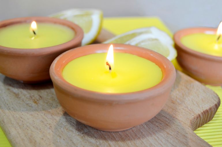 gettyimages-816927430-1746550081 Citronella Candles, close-up