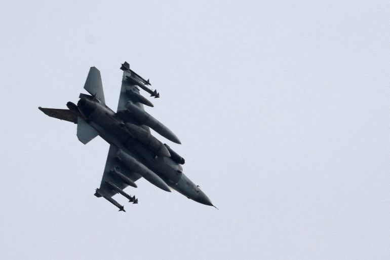 jet-f16-1711807942 FILE PHOTO: An Israeli Air Force F-16 fighter jet flies near the Israeli border with Gaza amid the ongoing conflict between Israel and the Palestinian Islamist group Hamas, as seen from Ashkelon, Israel, December 10, 2023 REUTERS/Amir Cohen/File Photo