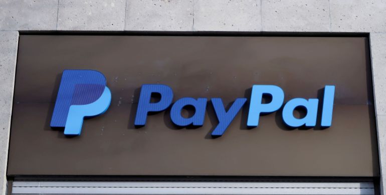 rc2vf2ajddsu-1691486110 FILE PHOTO: The PayPal logo is seen at an office building in Berlin