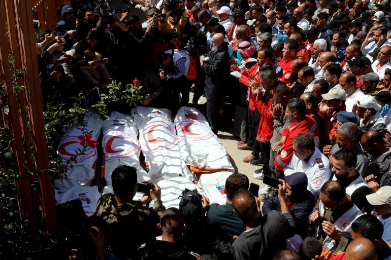 reuters_6821de63-1747050083 FILE PHOTO: Palestinians mourn medics, who came under Israeli fire while on a rescue mission, after their bodies were recovered, according to the Red Crescent, at Nasser hospital in Khan Younis in the southern Gaza Strip March 31, 2025. REUTERS/Hatem Khaled/File Photo