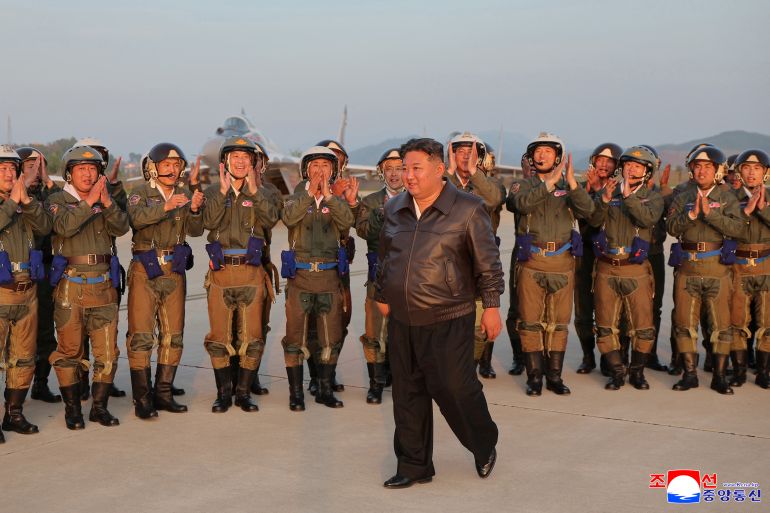 reuters_68281623-1747457571 North Korean leader Kim Jong Un is cheered by military pilots during a visit to an airfield in this photo released by the Korean Central News Agency, May 16, 2025. KCNA via REUTERS ATTENTION EDITORS - THIS IMAGE WAS PROVIDED BY A THIRD PARTY. REUTERS IS UNABLE TO INDEPENDENTLY VERIFY THIS IMAGE. NO THIRD PARTY SALES. SOUTH KOREA OUT. NO COMMERCIAL OR EDITORIAL SALES IN SOUTH KOREA.