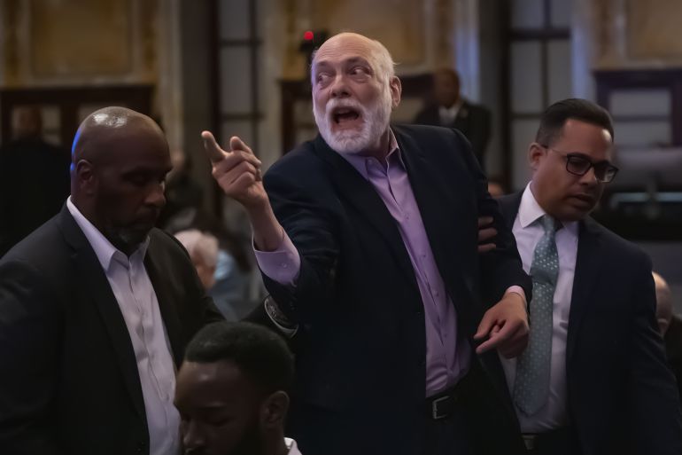 tfy6-1748594367 NEW YORK, UNITED STATES - MAY 29: New York Public Library security remove a protestor from inside the venue as multiple demonstrators disrupted United States Senator Chuck Schumer’s book signing event inside New York Public Library in New York, U.S., May 29, 2025