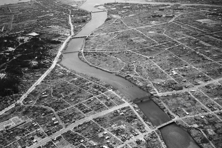 (Original Caption) 8/7/1945-Hiroshima, Japan: Here is a reconnaissance view of the Japanese Army base at Hiroshima, which was the first enemy target to feel the devestating weight of the new Atomic bomb. A quartering depot, Hiroshima was a large ordanance industrial center and has a population of more then 318,000. Reports of the atomic bomb blast have not been revealed, since reconnaissance planes reported the targer area still heavily veiled by smoke and dust clouds.