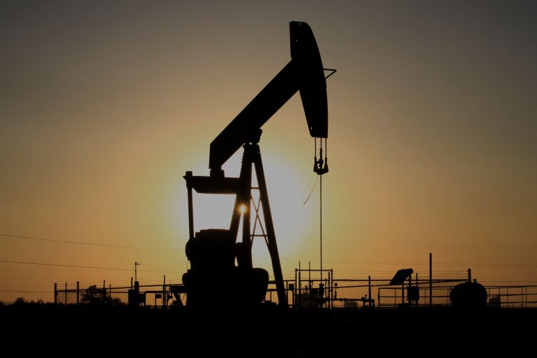 ap_683d7193f24cb-1748857236 A pump jack operates at sunset in the Permian Basin near Loving, N.M., on Tuesday, May 20, 2025. (AP Photo/Susan Montoya Bryan)