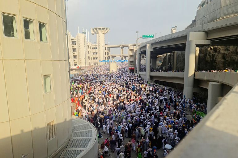 Hajj pilgrims moving towards Devil Pillar for throwing stones during a symbolic stoning of the devil, in Mina in Saudi Arabia's holy city of Mecca, Saudi Arabia. Location: Mina, Mecca, Saudi Arabia. Date Taken: June 17, 2024