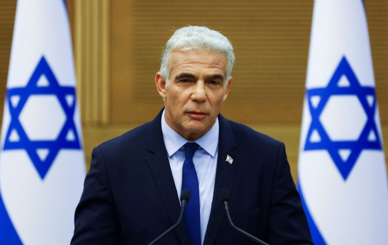 rts8uui6 Israeli Prime Minister Naftali Bennett and Foreign Minister Yair Lapid give a statement, in Jerusalem