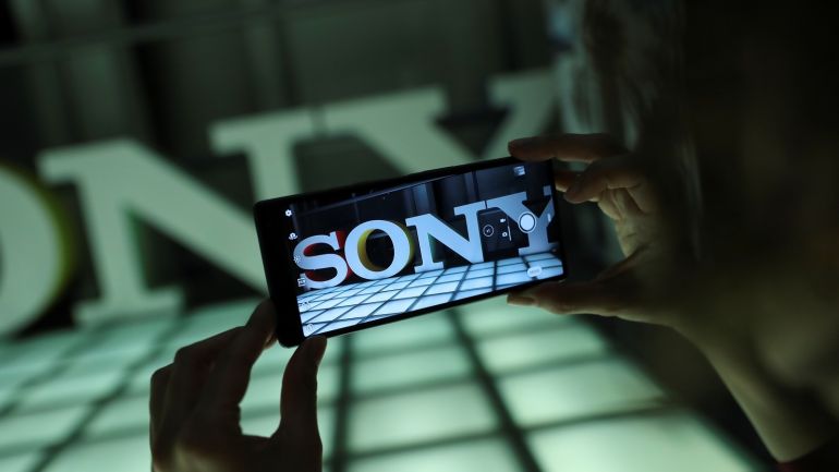 An employee takes a photo on a new Sony Xperia 10 Plus in this posed photograph at a pre-launch event at the Sony offices in London, Britain February 14, 2019. Picture taken February 14, 2019. REUTERS/Simon Dawson