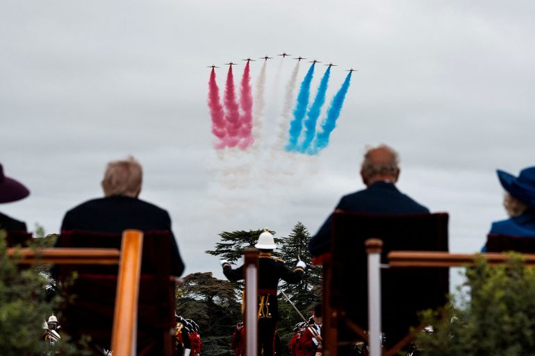 The Red Arrows, the Royal Air Force display team, roared overhead as U.S. President Donald Trump, Britain's King Charles III, Queen Camilla, and First Lady Melania Trump watch the Beating Retreat Ceremony at Windsor Castle, in Windsor, England, Wednesday, Sept. 17, 2025. Doug Mills/The New York Times/Pool via REUTERS