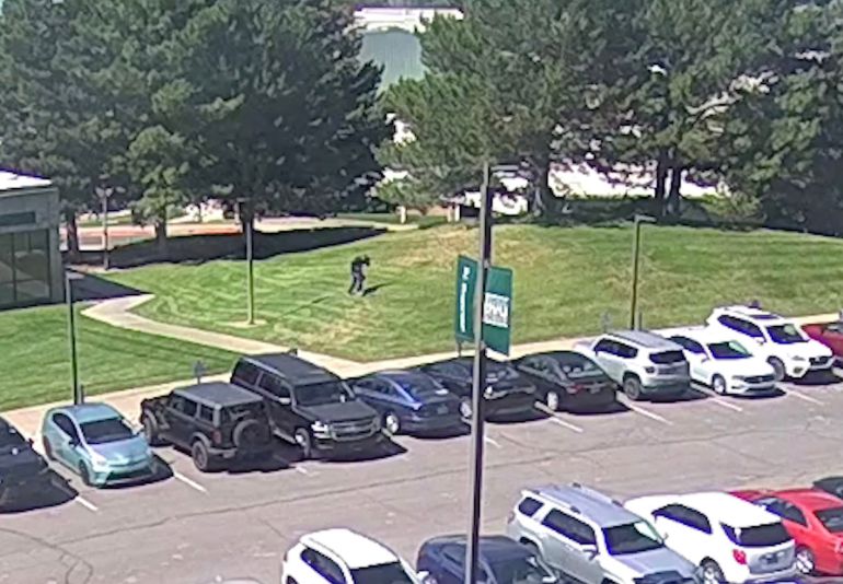 afp_68c41fcc199d-1757683660 This screenshot taken from a video footage released by the Federal Bureau of Investigation (FBI) on September 11, 2025 shows a person of interest running on the lawn at Utah Valley University in Orem, Utah, immediately after the fatal shooting of Charlie Kirk.