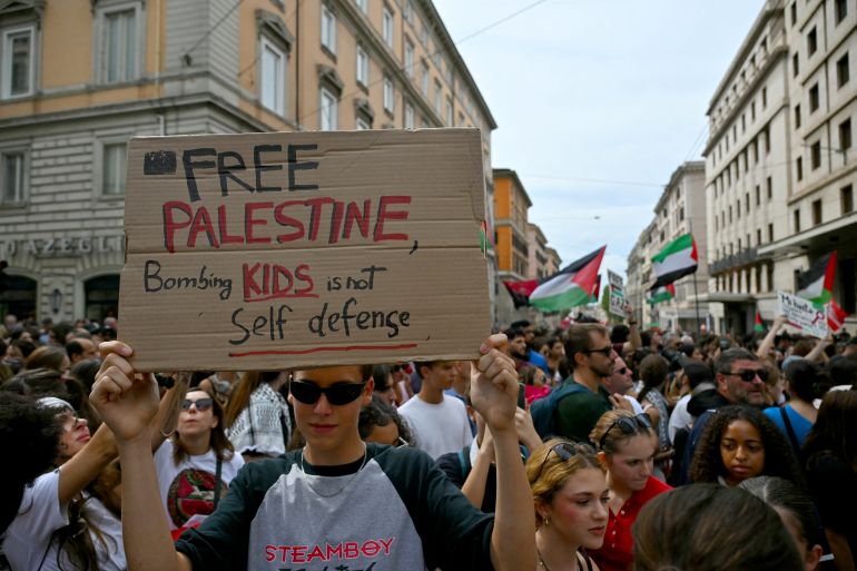 People march during a nationwide strike "Let's Block Everything" in solidarity with Palestinians in Gaza and calling for a halt to arms shipments to Israel, in Rome on September 22.