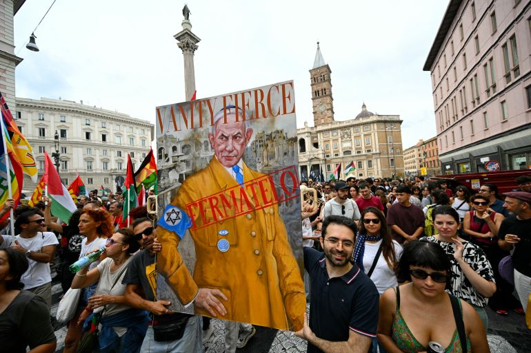 People march during a nationwide strike "Let's Block Everything" in solidarity with Palestinians in Gaza and calling for a halt to arms shipments to Israel, in Rome on September 22.