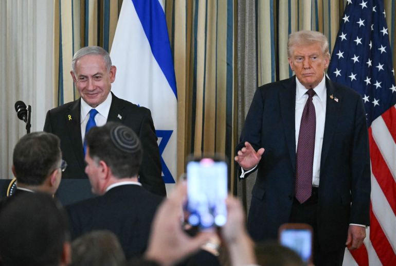 afp_68dbbb03bdfc-1759230723 US President Donald Trump and Israeli Prime Minister Benjamin Netanyahu stand at the conclusion of a joint press conference in the State Dining Room of the White House in Washington, DC on September 29, 2025.