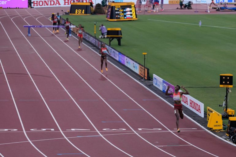 ap_68cbaf43f1777-1758179140 Kenya's Faith Cherotich crosses the finish line to win the women's 3,000 meters steeplechase final at the World Athletics Championships in Tokyo, Wednesday, Sept. 17, 2025. (AP Photo/Abbie Parr)