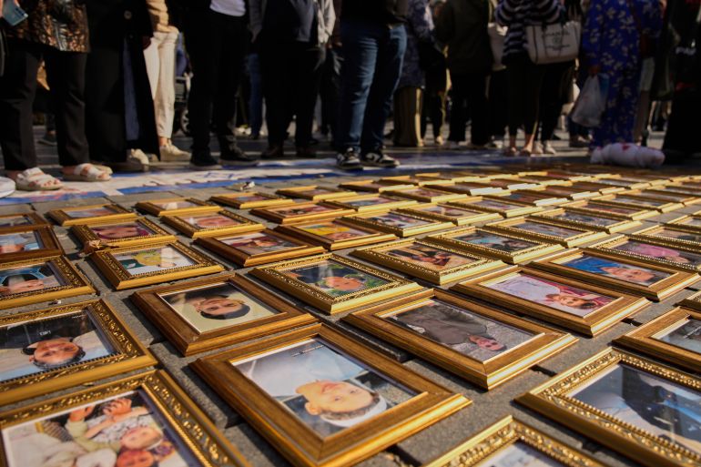 Photos of Palestinian children killed during the Israeli air and ground operations in the Gaza Strip are displayed during a pro-Palestinians protest, in Istanbul, Turkey, Saturday, Sept. 27, 2025. (AP Photo/Emrah Gurel)