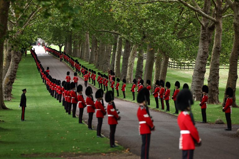 Armed Forces personnel line the route ahead of the Carriage Procession, in Windsor, on September 17, 2025, during US President Donald Trump's second State Visit to the UK. HENRY NICHOLLS/Pool via REUTERS