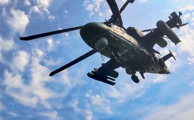 epa12370965 A still image taken from a handout video provided by the Russian Defence Ministry press service on 12 September 2025 shows a Russian Ka-52 attack helicopter taking part in the Zapad-2025 joint military drills at an undisclosed location in Belarus. The 'Zapad 2025' joint strategic military exercise will be conducted by the Russian and Belarusian armed forces from 12 to 16 September 2025. EPA/RUSSIAN DEFENCE MINISTRY PRESS SERVICE HANDOUT HANDOUT EDITORIAL USE ONLY/NO SALES