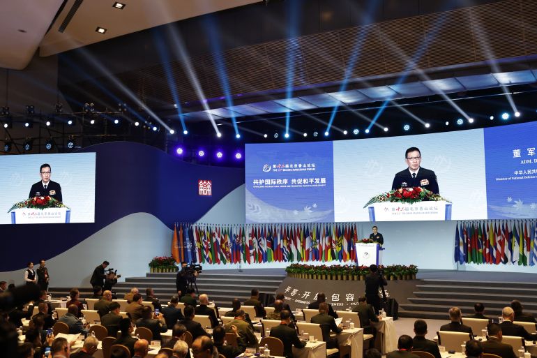 epa_68cba202678c-1758175746 epa12386100 Minister of National Defense of China Admiral Dong Jun delivers a speech during the opening ceremony of the 12th Beijing Xiangshan Forum in Beijing, China, 18 September 2025. The 12th Beijing Xiangshan Forum is held between 17 and 19 September 2025. EPA/ANDRES MARTINEZ CASARES